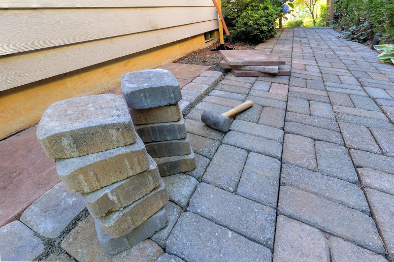 Concrete Walkways Vs. Pavers: Which Option Fits Your Property Best